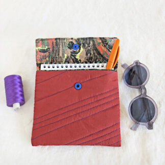 Pochette matelassée rouge brique