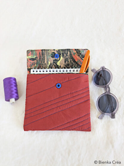Pochette matelassée rouge brique