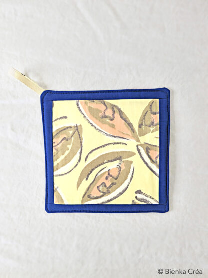 Manique jaune à motifs marron et rose