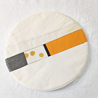 Dessous de plat écru orange et noir