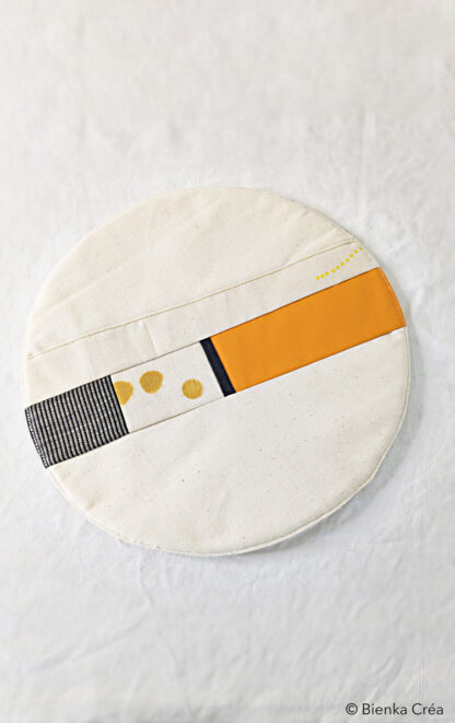 Dessous de plat écru orange et noir