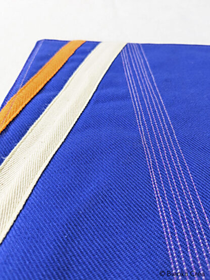 Dessous de plat bleu à rayures oranges et blanches – Image 3
