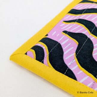 Manique à motifs zébrés