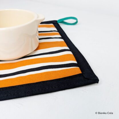 Manique orange et noire